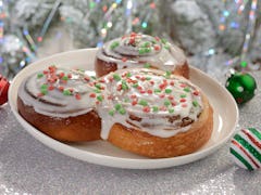 Mickey's Very Merry Christmas Party 2022 includes a Mickey-shaped cinnamon roll. 