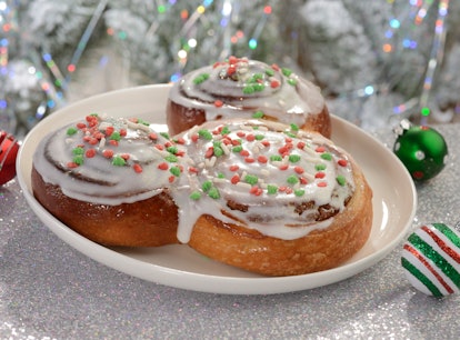 Mickey's Very Merry Christmas Party 2022 includes a Mickey-shaped cinnamon roll. 