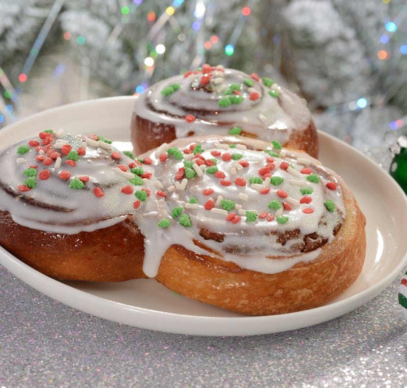 Mickey's Very Merry Christmas Party 2022 includes a Mickey-shaped cinnamon roll.