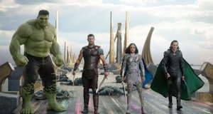 The Hulk, Thor, Valkyrie, and Loki stand on the rainbow bifrost bridge in Thor: Ragnarok