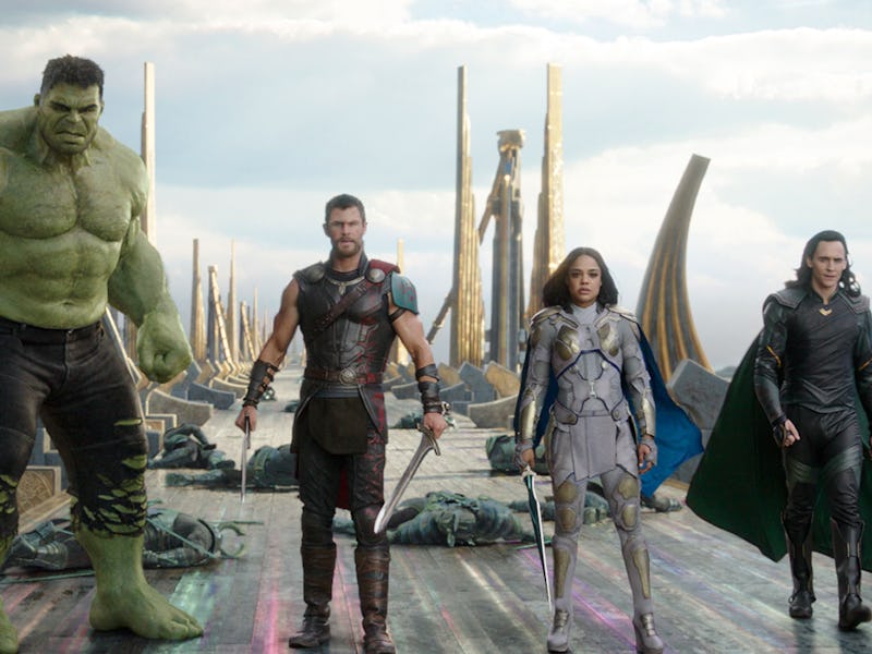 The Hulk, Thor, Valkyrie, and Loki stand on the rainbow bifrost bridge in Thor: Ragnarok