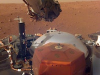InSight's instruments are visible here with the Martian surface in the background