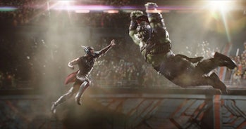 Thor (Chris Hemsworth) and The Hulk (Mark Ruffalo) leap toward each other in Thor: Ragnarok