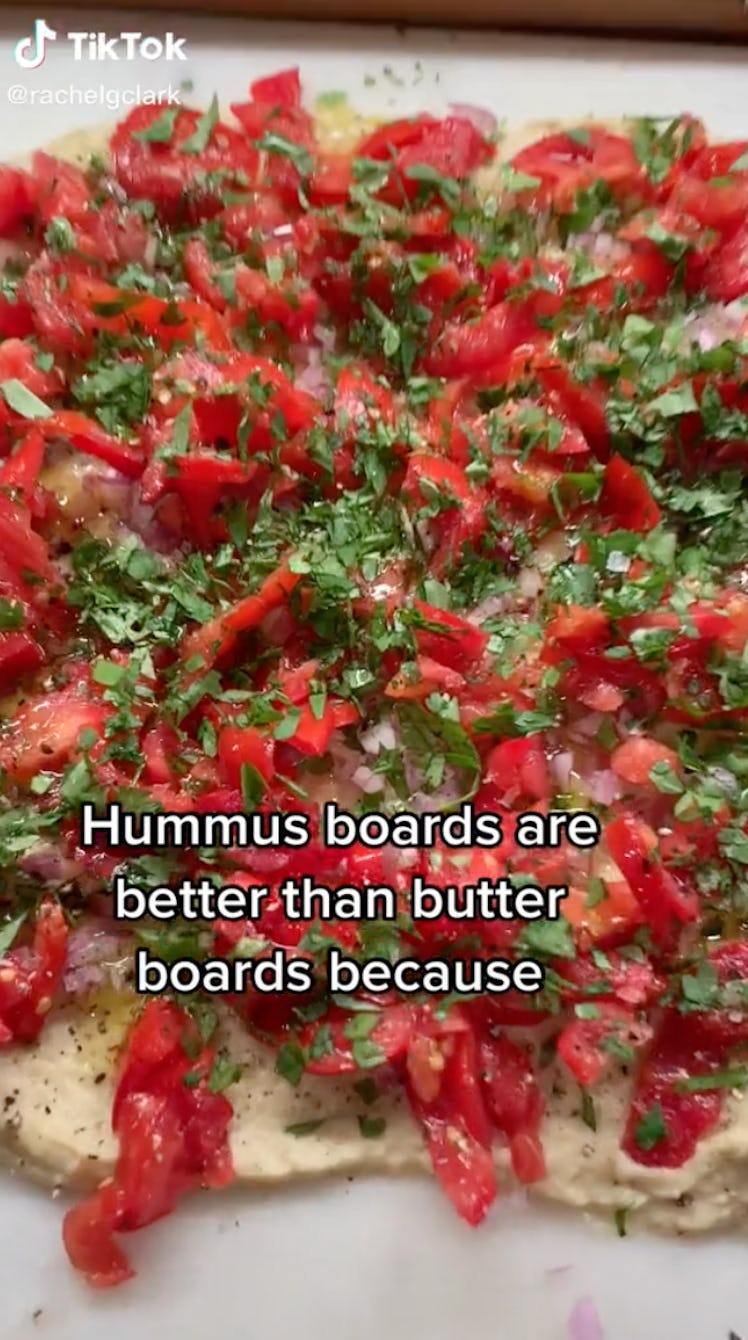 A tomato hummus board is a fall hummus board idea from TikTok for game day or friendsgiving.