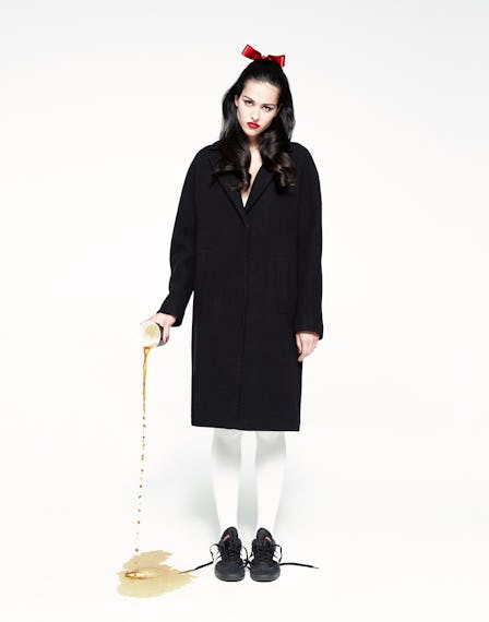Amelia Gray wears a Herno coat; Wolford tights; Adidas sneakers.