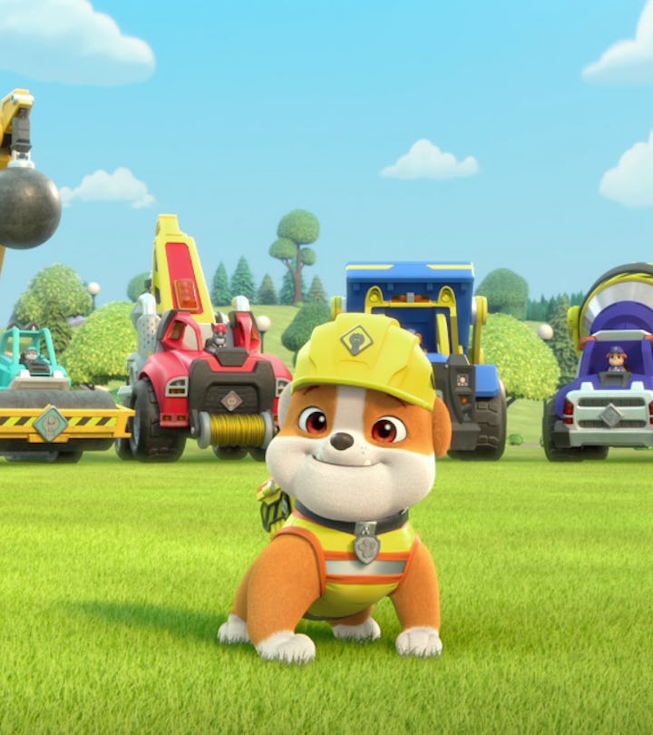 Rubble the bulldog stands in front of a fleet of construction vehicles in 'Rubble and Crew,' a 'PAW ...