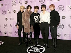 Gayle and TXT posed with each other at the 2022 American Music Awards.