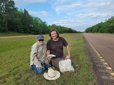 Linda Welzenbach Fries and her husband, Marc Fries, pose near the side of the road near Cranfield wi...
