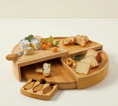 This Compact Swivel Cheese Board With Knives is one of the best gifts to give your mother-in-law for...