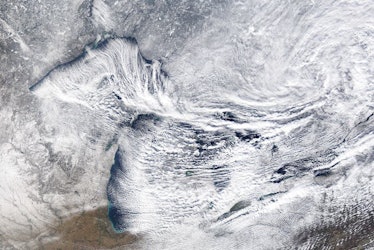 Canadian winds pick up moisture over the Great Lakes, turning it into heavy snowfall on the far shor...