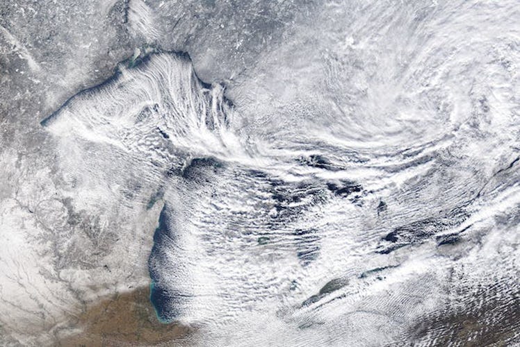 Canadian winds pick up moisture over the Great Lakes, turning it into heavy snowfall on the far shor...