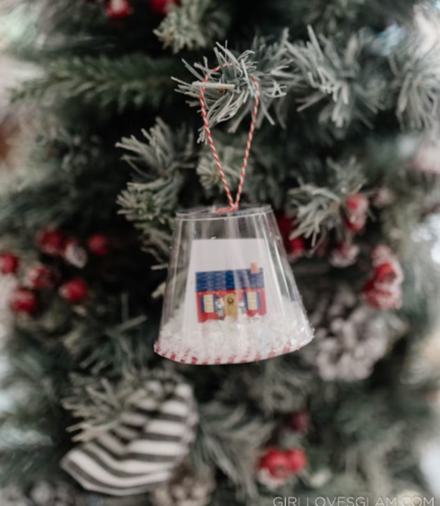 A DIY snow globe ornament made by your kids is a great gift idea for your mother-in-law.