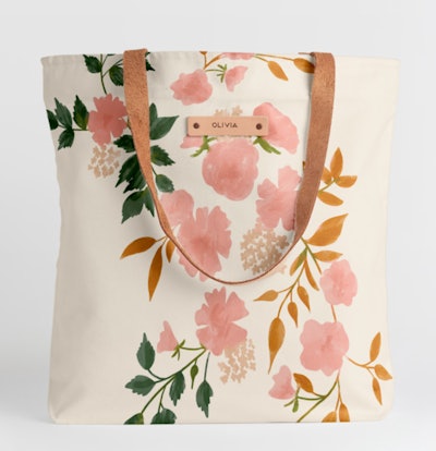 This Botanical Cascade Snap Tote With Personalization is one of the best Christmas gifts to give you...