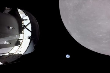 The Earth is seen setting from the far side of the Moon just beyond the Orion spacecraft in this vid...
