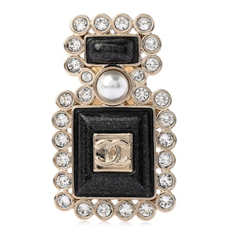 Chanel black and gold perfume bottle brooch