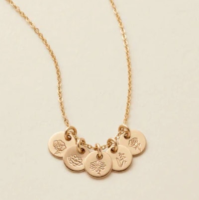This Mini Birth Flower Stacker Necklace is one of the best Christmas gifts for your mother-in-law.