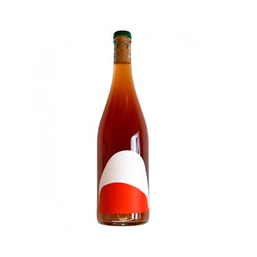 a bottle of natural wine with a chic label