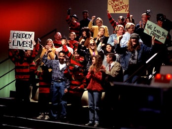 A studio audience cheers on Robert Englund/Freddy Krueger.