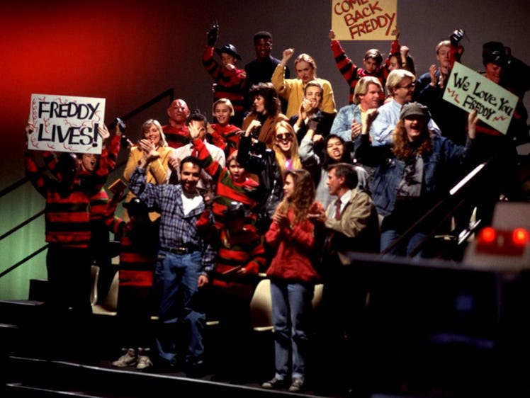 A studio audience cheers on Robert Englund/Freddy Krueger.