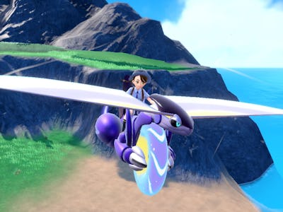 female player riding miraidon in glide mode