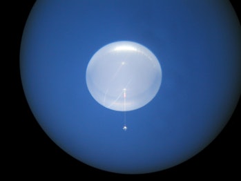A photo taken through a telescope of NASA’s super pressure balloon over Antarctica.