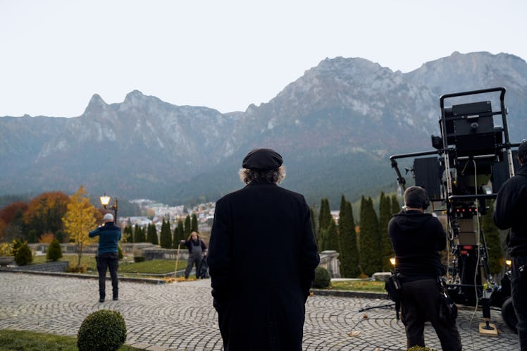 Tim Burton on location where 'Wednesday' was filmed in Romania.
