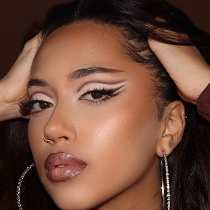 Model with straight across brows and cut crease