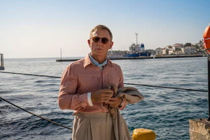 Daniel Craig stands in Greece in 'Glass Onion,' which is where 'Knives Out 2' was filmed. 
