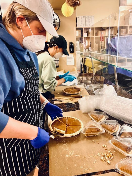 Meghan Markle helps serve lunch to 300 at the Downtown Women's Center in Los Angeles on Thanksgiving...