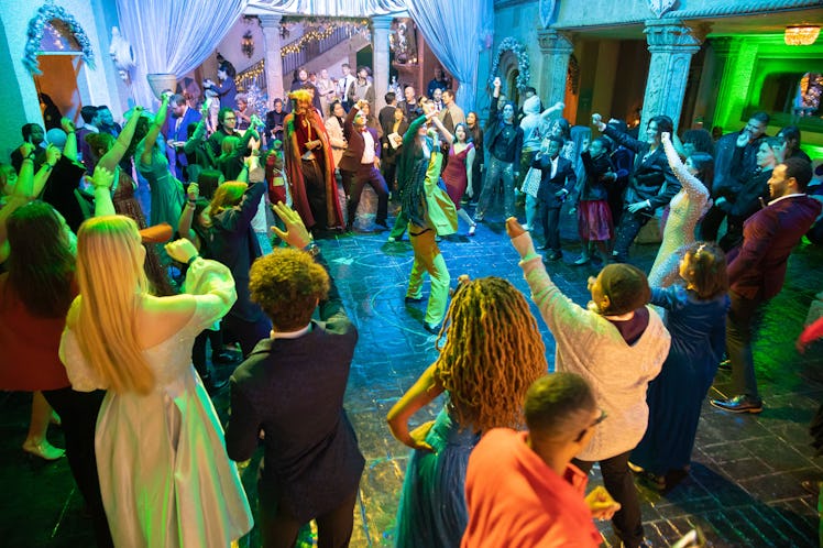 Guests dance on the dance floor of the Harry Potter: A Yule Ball Celebration in Houston. 