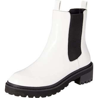a pair of white lug-sole chelsea boots