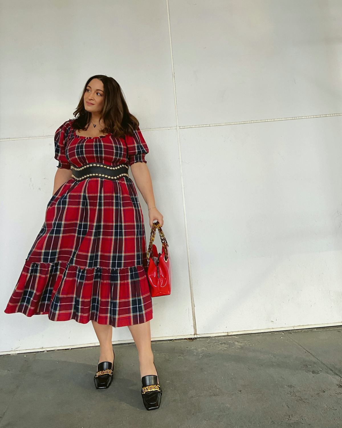 Model wears a Hill House Home nap dress and black La Canadienne loafers.