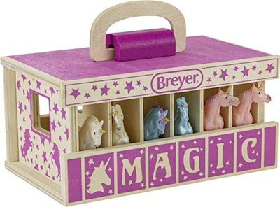 Breyer Horses Unicorn Magic Wooden Stable Playset is a best 2022 holiday toy for toddlers