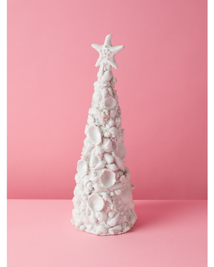 This seashell Christmas tree is part of the 2022 holiday home decor trends, according to experts. 