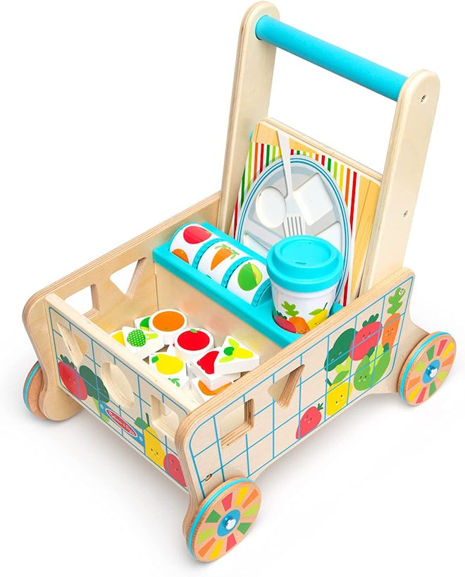 Melissa & Doug Wooden Shape Sorting Grocery Cart Push Toy  is a popular 2022 holiday toy for 1-year-...