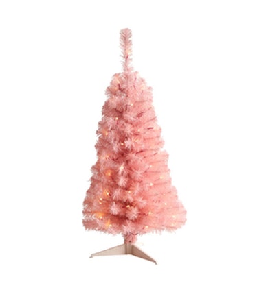 This pink Christmas tree is part of the 2022 holiday home decor trends, according to experts. 