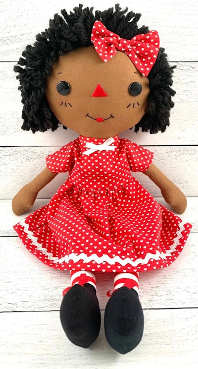 etsy Step Stitches Personalized Black Doll  is a popular 2022 holiday toy for 1-year-olds
