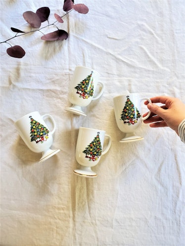 These holiday mugs are part of the 2022 holiday home decor trends, according to experts. 