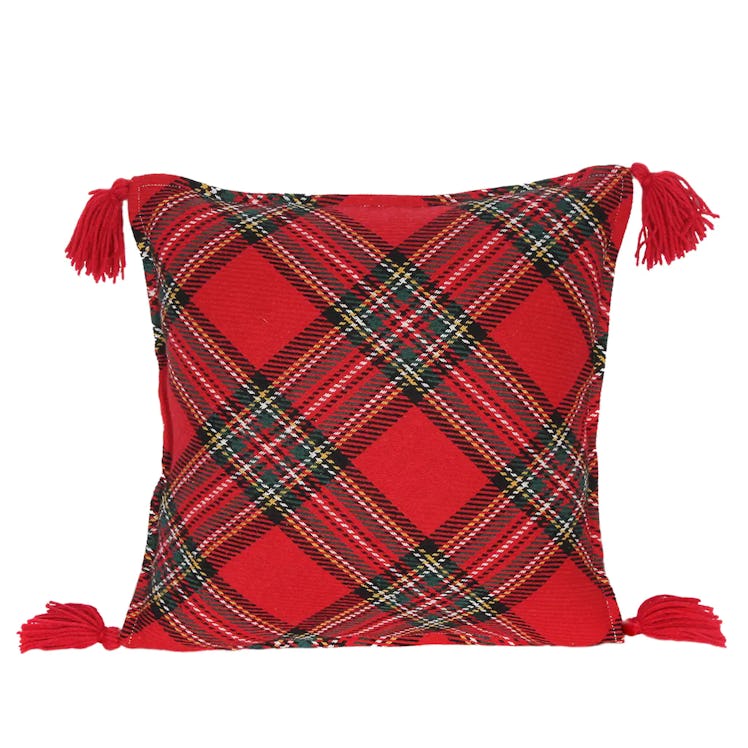 This throw pillow is part of the 2022 holiday home decor trends, according to experts.