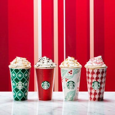 https://imgix.bustle.com/uploads/image/2022/11/3/be744660-019c-4f2d-8979-9bbea0fb24c0-starbucks_holiday_cups-stripes-1.jpg?w=374&h=374&fit=crop&crop=faces&auto=format%2Ccompress