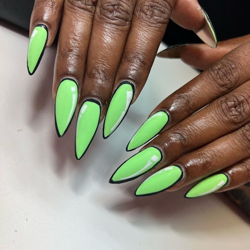 Comic book nails are the pop art-inspired manicures taking TikTok by storm.  Here, neon green comic ...