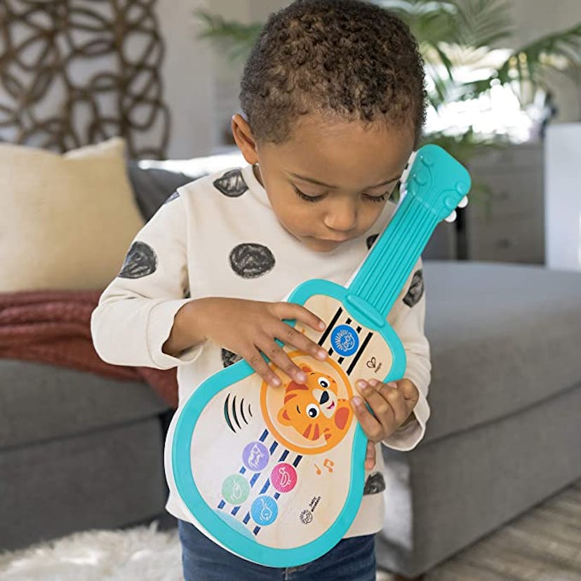 Baby Einstein Sing & Strum Magic Touch Wooden Ukulele