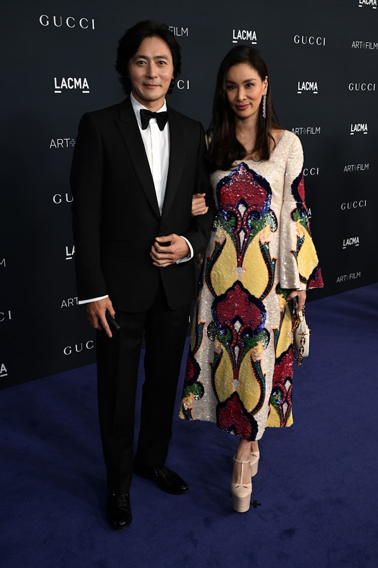 Jang Dong-Gun and So-Young Ko, both wearing Gucci, attend the 2022 LACMA ART+FILM GALA Presented By ...