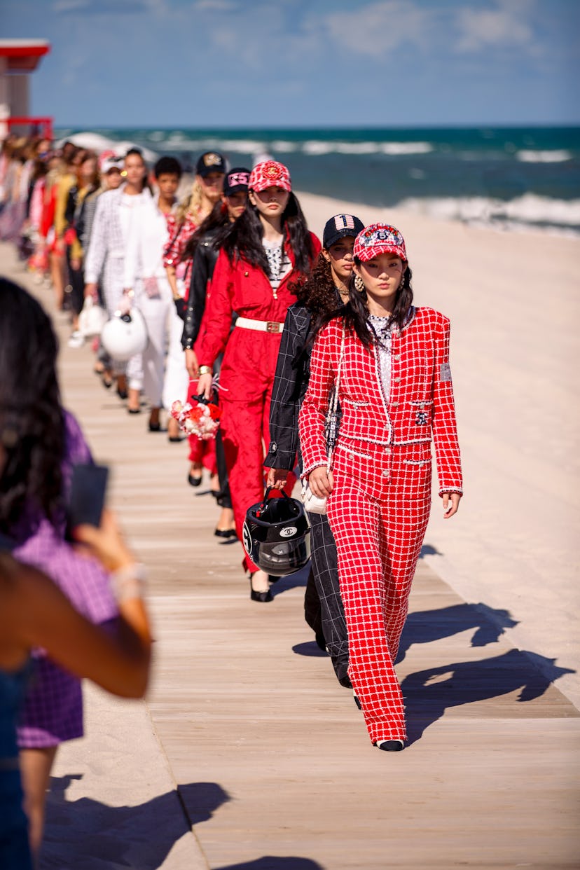 Chanel models walking on the beach in Southern Florida