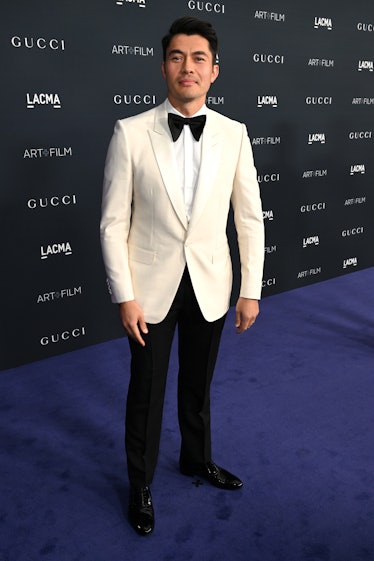 Henry Golding, wearing Gucci, attends the 2022 LACMA ART+FILM GALA Presented By Gucci at Los Angeles...