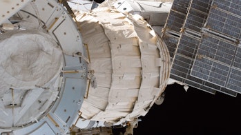 An image of the BEAM module attached to the ISS in space.