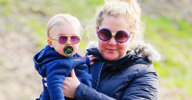 Amy Schumer's 3-year-old son Gene was hospitalized for RSV while the comedian was working in rehears...