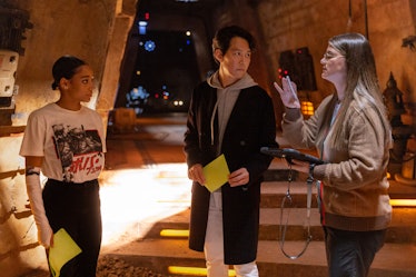 Leslye Headland (far left) directs Amandla Stenberg and Lee Jung-jae on the set of The Acolyte.