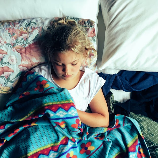Child sick in bed