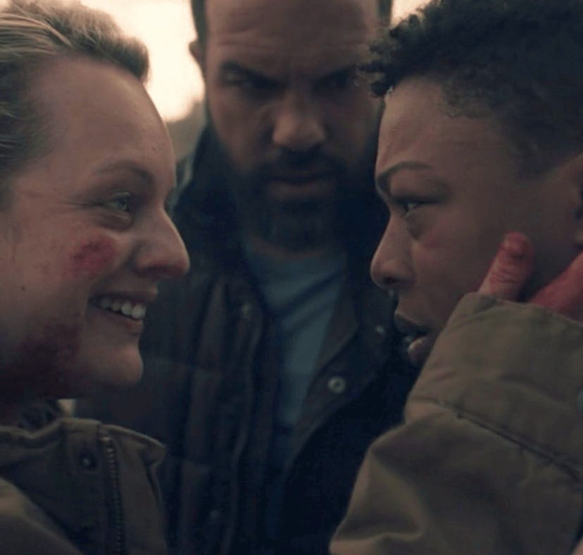 Elisabeth Moss as June Osborne, O-T Fagbenle as Luke Bankole, Samira Wiley as Moira Strand in The Ha...